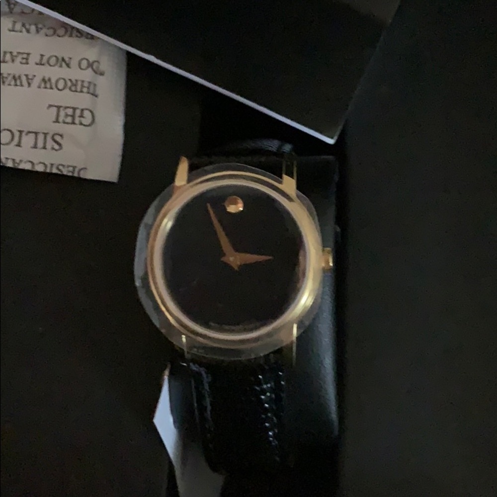 🚨🚨MOVADO BLACK AND GOLD WATCH 🚨100% AUTHENTIC